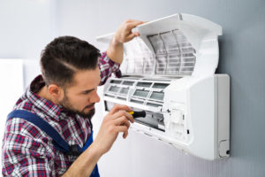 hvac technician providing air conditioning repair