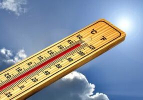 Outdoor thermometer shows high temperature
